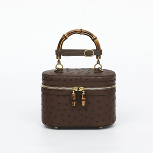 Genuine Ostrich Leather Women's Oval Cosmetic Crossbody with Bamboo Handle