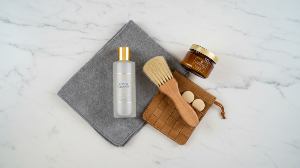 flat-lay-of-luxury-leather-care-tools-and-products