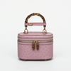 Genuine Ostrich Leather Women's Oval Cosmetic Crossbody with Bamboo Handle