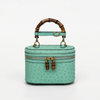 Genuine Ostrich Leather Women's Oval Cosmetic Crossbody with Bamboo Handle