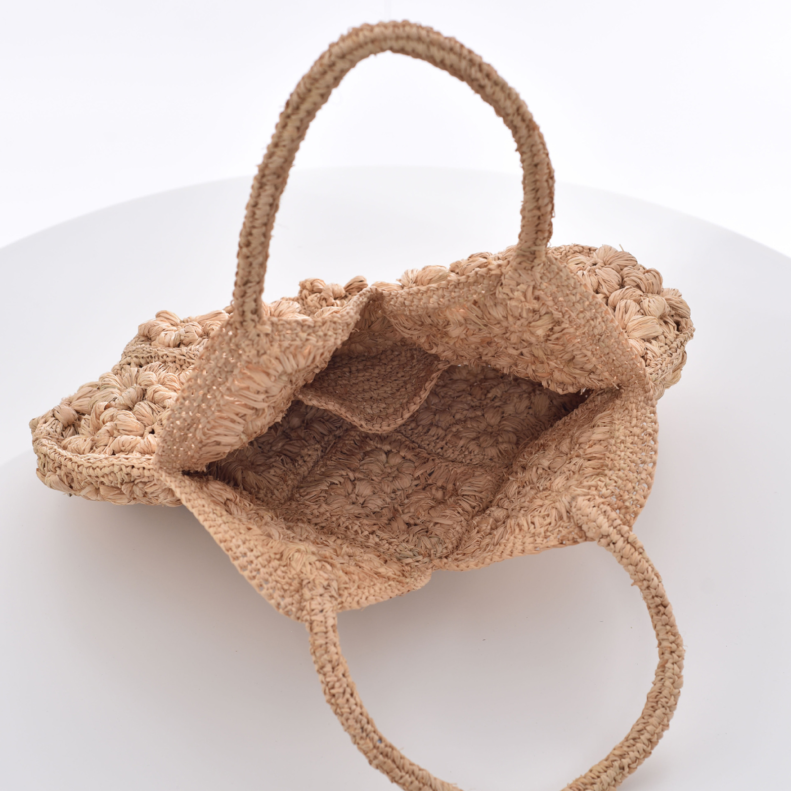 Handcrafted Raffia Tote Bag with Floral Accents 4