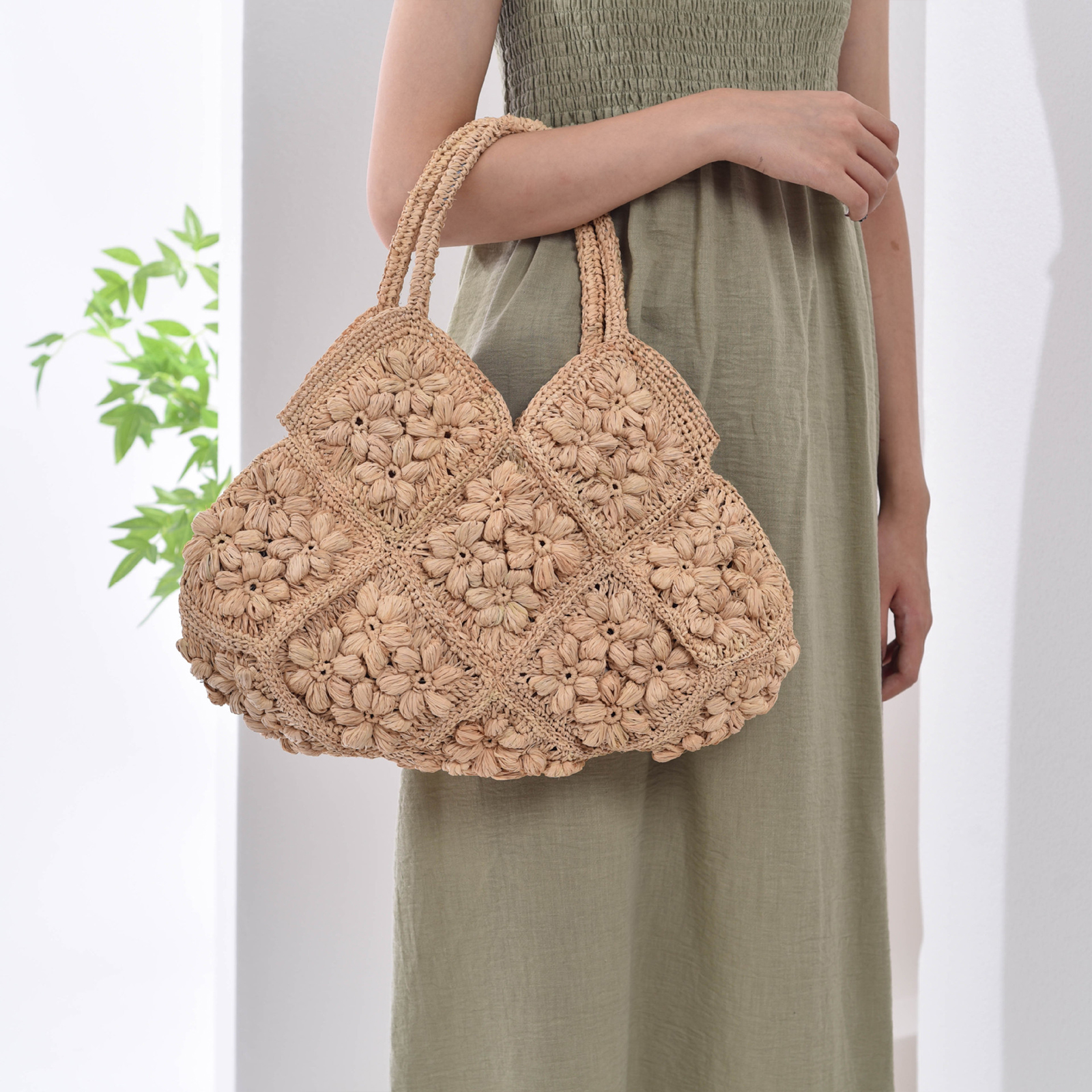 Handcrafted Raffia Tote Bag with Floral Accents 11
