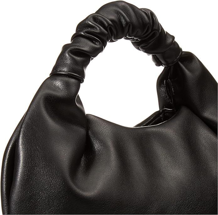 Premium PU handbag, close-up of textured surface