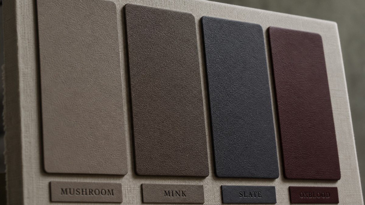 Four leather swatches — mushroom, mink, slate, and oxblood — on linen board