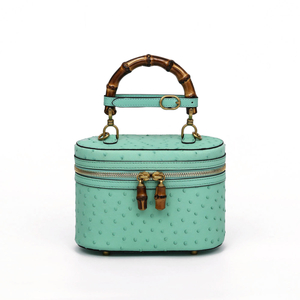 Genuine Ostrich Leather Women's Oval Cosmetic Crossbody with Bamboo Handle