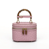 Genuine Ostrich Leather Women's Oval Cosmetic Crossbody with Bamboo Handle